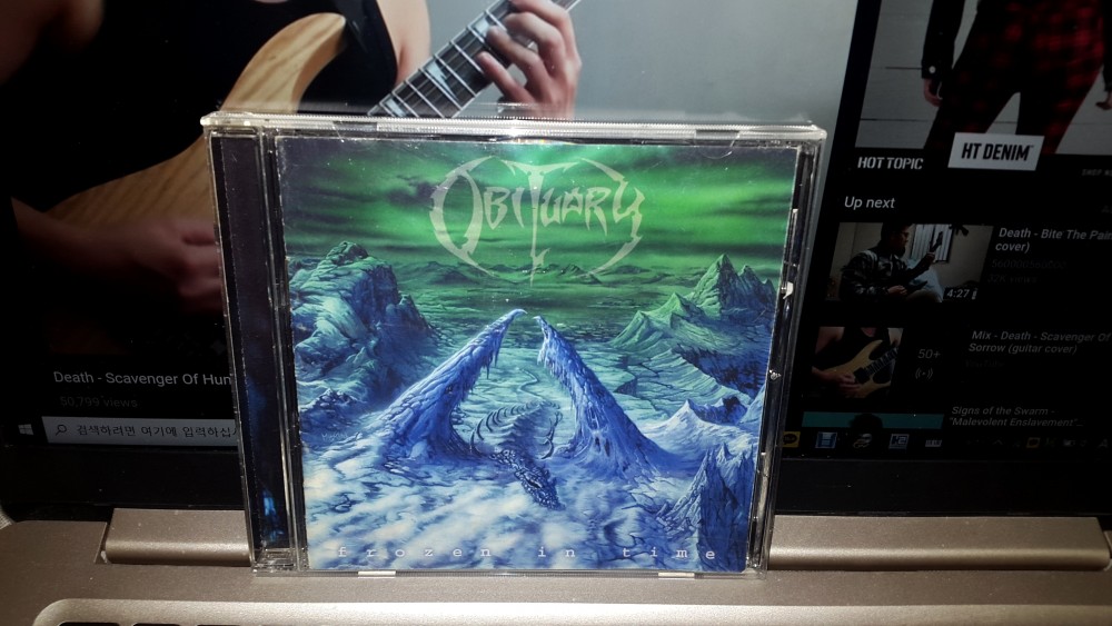 Obituary - Frozen in Time Photo