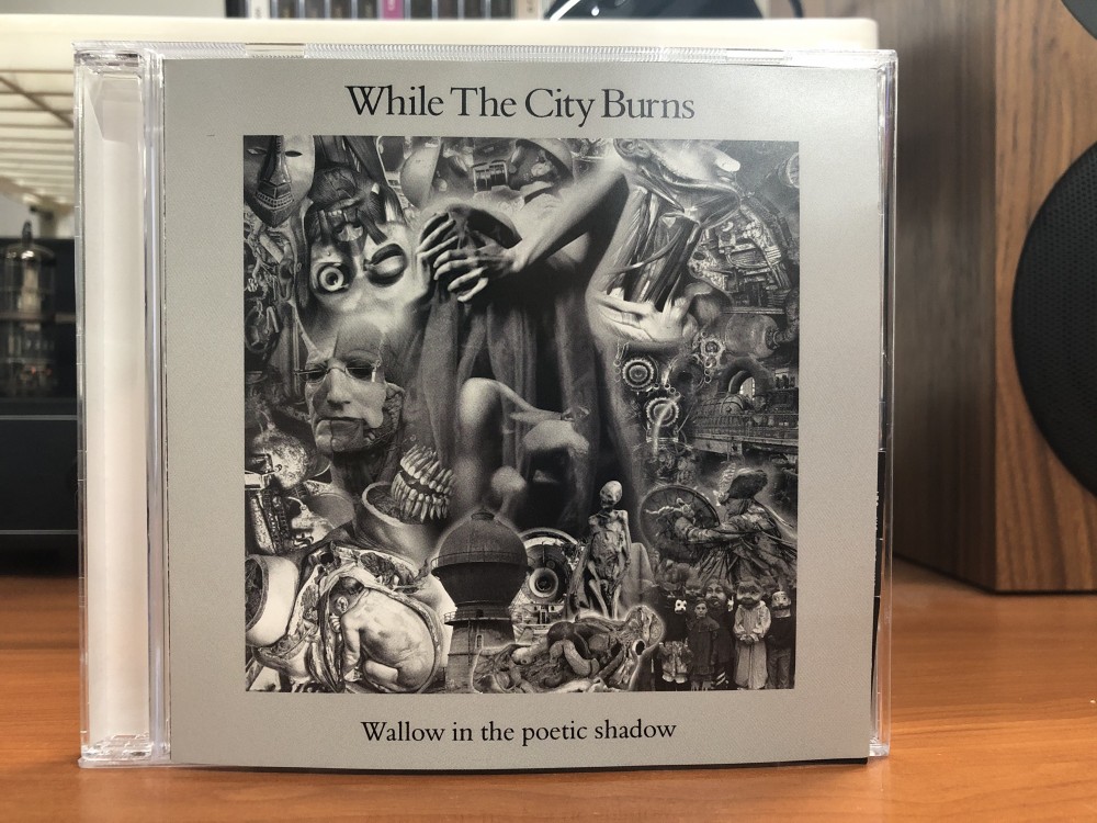 While The City Burns - Wallow In The Poetic Shadow CD Photo