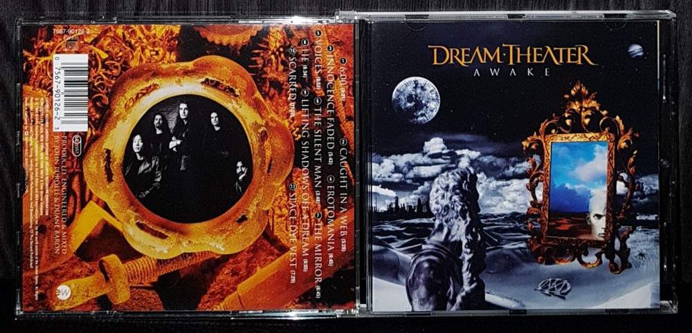 Альбом theatre dreams. Dream Theater Awake 1994. Dream Theater обложки альбомов. Группа Dream Theater альбомы. Dream Theater CD.