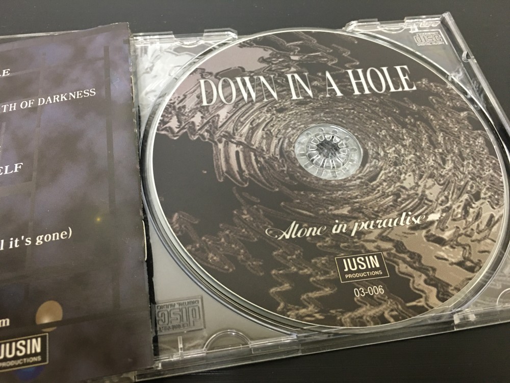 Down In A Hole - Alone in Paradise CD Photo