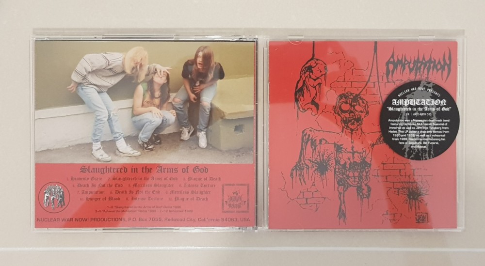 Amputation - Slaughtered in the Arms of God CD Photo